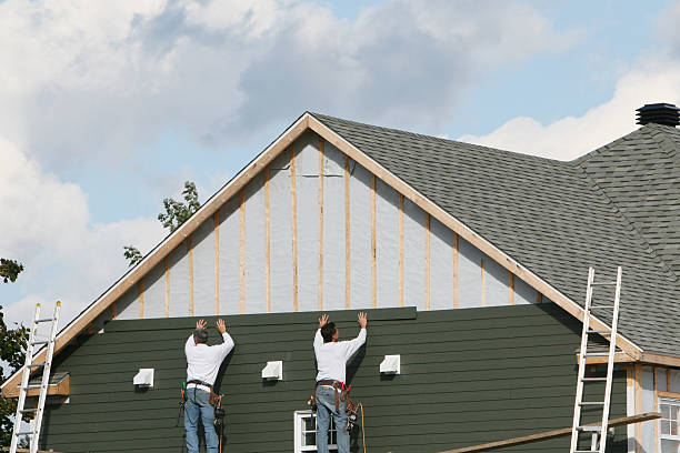 Professional Emergency Siding Repair technician working in Marysville, OH